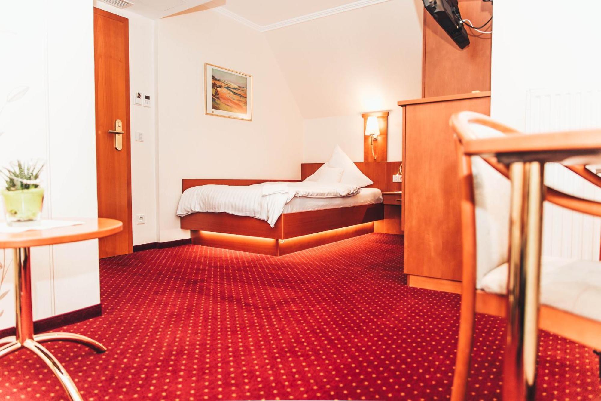 Ringhotel Teutoburger Wald Текленбург Номер фото